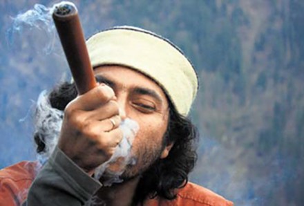 Filmmaker Amlan Dutta smoking...something.